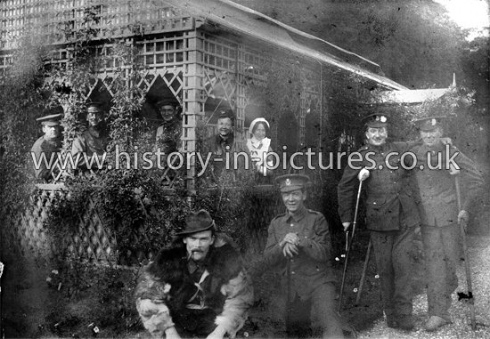 Wounded Soldiers in the Summer House, St John's Hospital, Weston Favell, Northamptonshire. c.1916.